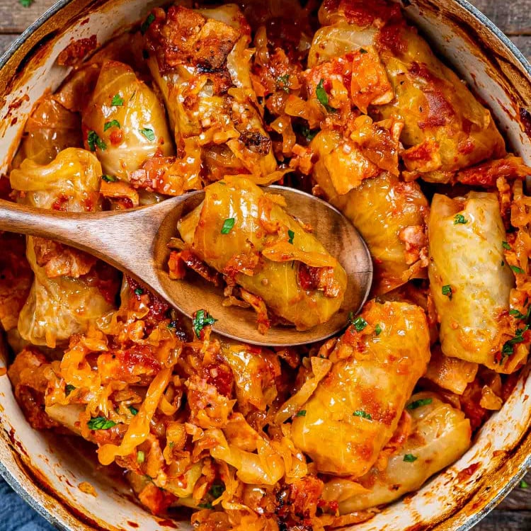 freshly baked romanian cabbage rolls in a dutch oven.