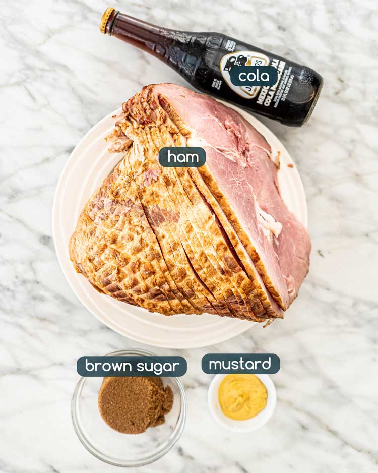 overhead shot of ingredients needed to make Crockpot Brown Sugar Cola Glazed Ham